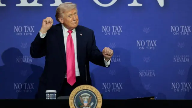 Trump gestures during a roundtable focused on tax cuts in Las Vegas, Nevada