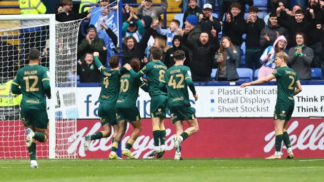 Marcus Harness  celebrates scoring a penalty for Huddersfield