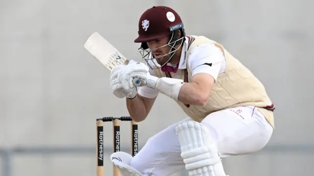 Craig Overton ducks under a short ball