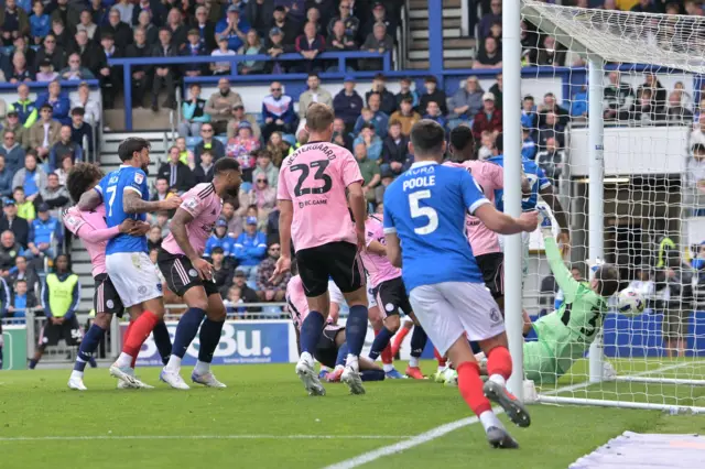 Ibane Bowat (17) of Portsmouth scores the opening goal