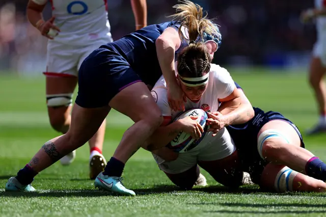 Kelsey Clifford scoring a try