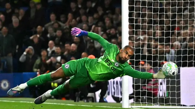 Robert Sanchez saves a shot