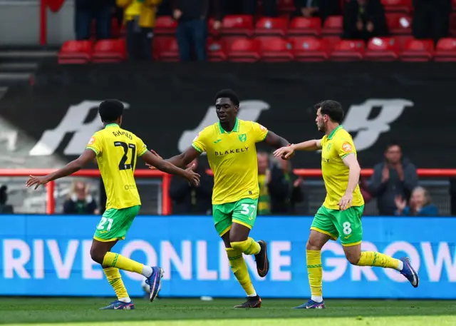 Mohamed Toure of Norwich City celebrates scoring an equaliser