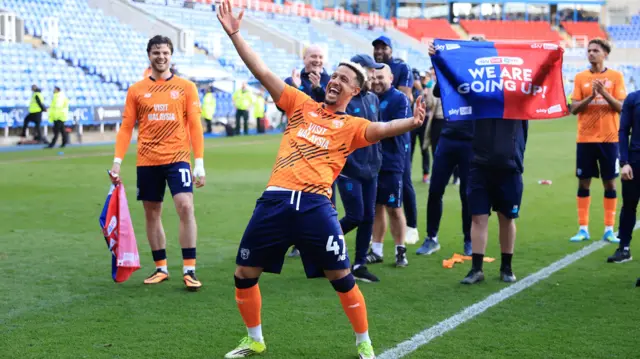 Cardiff City's Callum Robinson celebrates securing promotion to the Championship