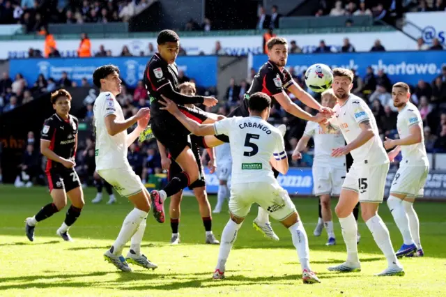 Southampton's Shea Charles (centre left) scores