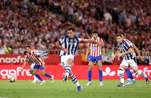 Mikel Oyarzabal of Real Sociedad scores