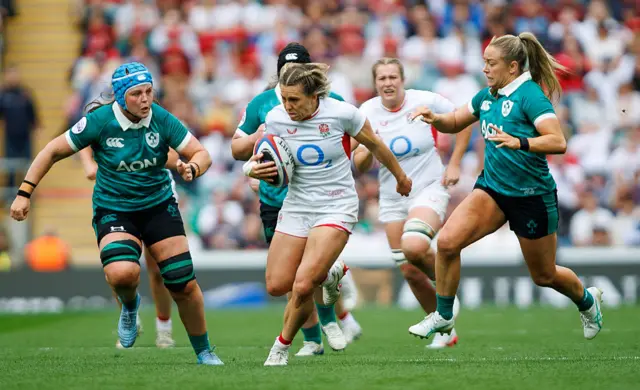 Claudia Moloney-MacDonald runs with the ball