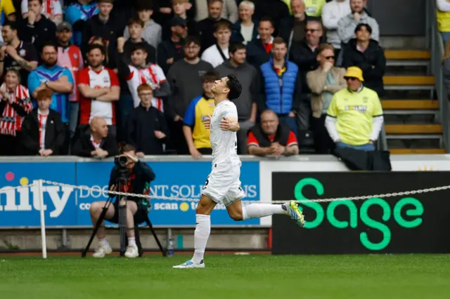 Marko Stamenic of Swansea City celebrates