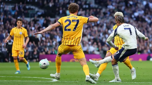 Xavi Simons of Tottenham Hotspur scores their second goal