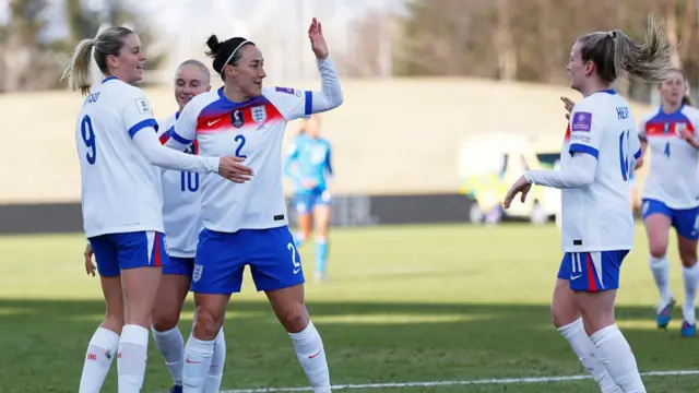 England players celebrate Alessia Russo's goal