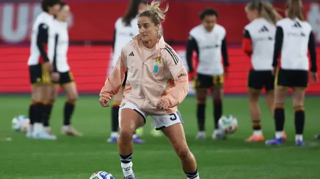 Scotland forward Sophie Howard warming up