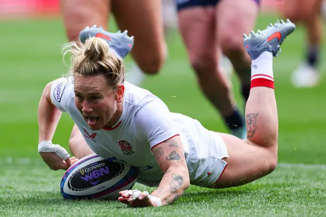 Meg Jones scoring a try