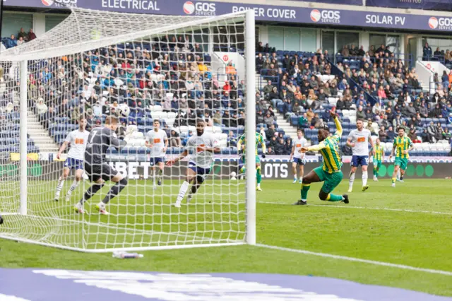 Daryl Dike of West Bromwich Albion scores a goal and celebrates