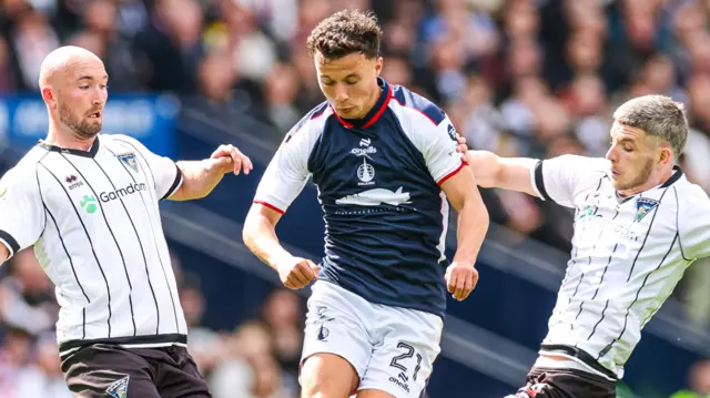 Dunfermline's Chris Kane and Charlie Gilmour attempt to challenge Falkirk's Dylan