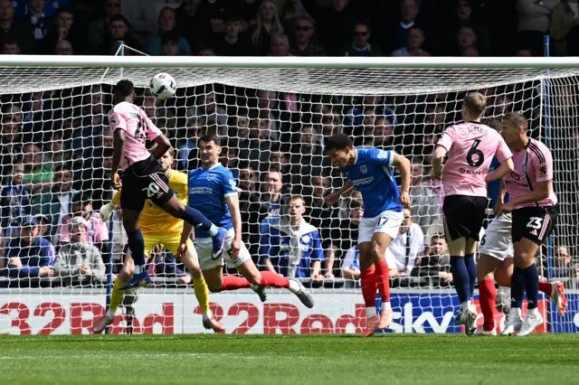 Patson Daka (20) of Leicester City heads a shot at goal