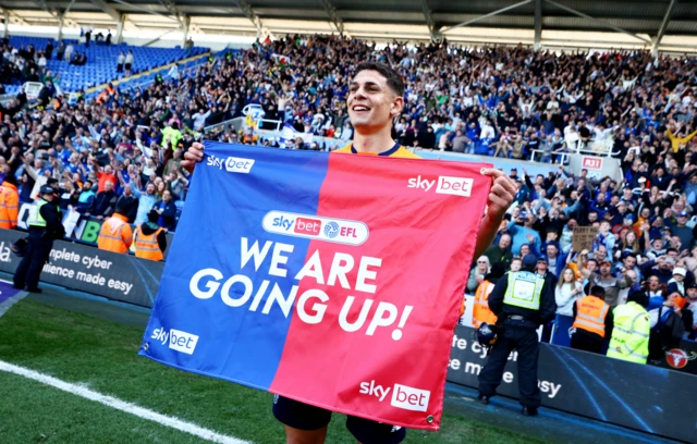 Cardiff players celebrate with the fans
