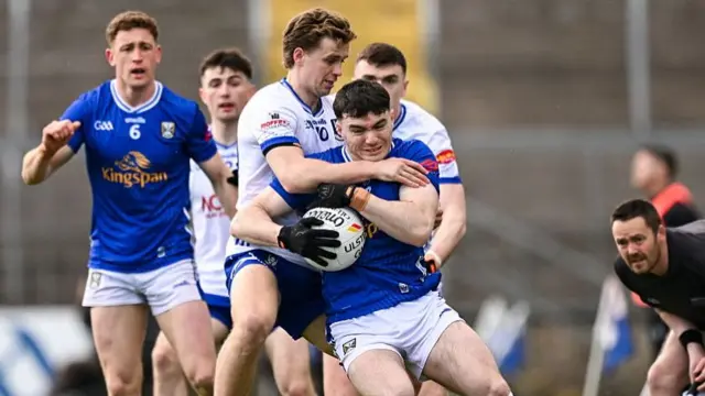 Monaghan and Cavan battle for the ball