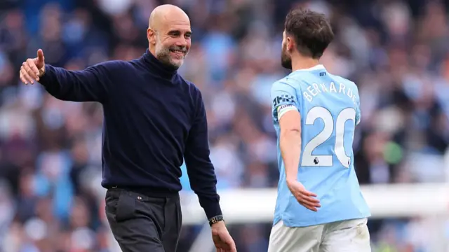 Pep Guardiola and Bernardo Silva