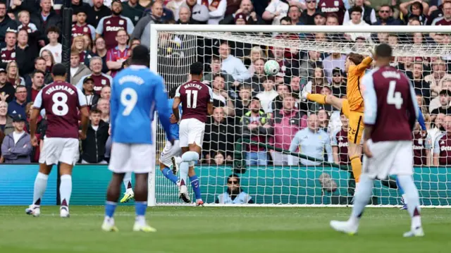 Ollie Watkins of Aston Villa scores his team's first goal