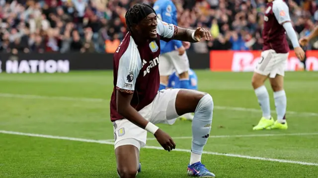Tammy Abraham of Aston Villa celebrates scoring his team's fourth goal