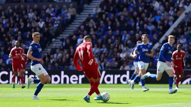 Mohamed Salah of Liverpool scores his team's first goal
