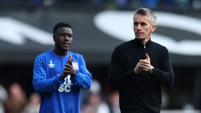 Kieran McKenna applauds the fans