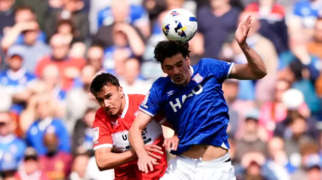 Ipswich Town's Jacob Greaves and Middlesbrough's David Strelec battle for the ball
