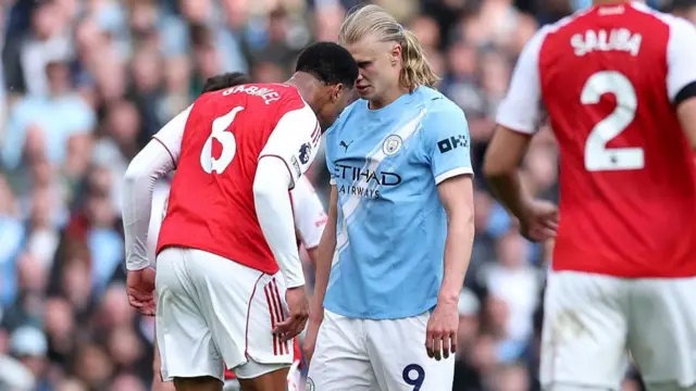 Gabriel and Erling Haaland clash