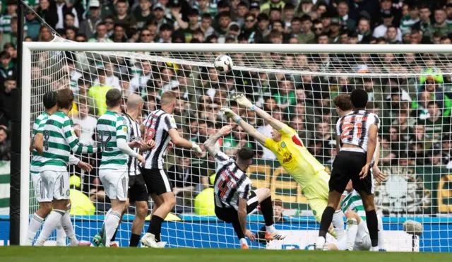 Celtic Goalkeeper Viljami Sinisalo makes a save to deny St Mirren's Liam Donnelly during a Scottish Gas Scottish Cup semi-final match between Celtic and St Mirren at Barclays Hampden, on April 19, 2026, in Glasgow, Scotland.