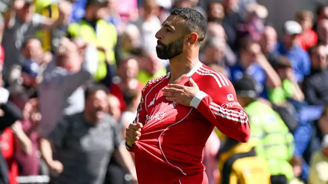 Mohamed Salah of Liverpool celebrates scoring his team's first goal