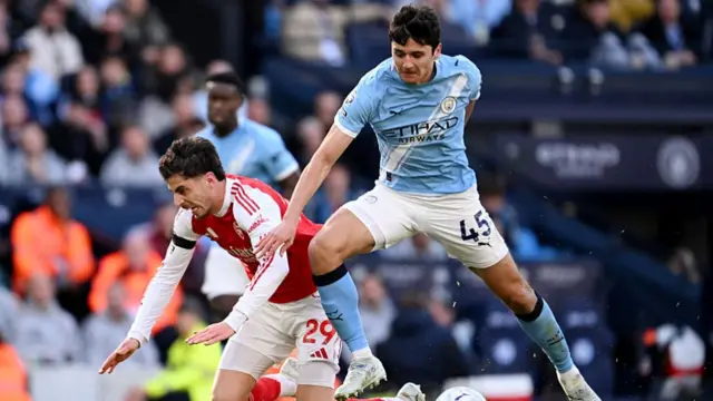 Kai Havertz of Arsenal is fouled by Abdukodir Khusanov