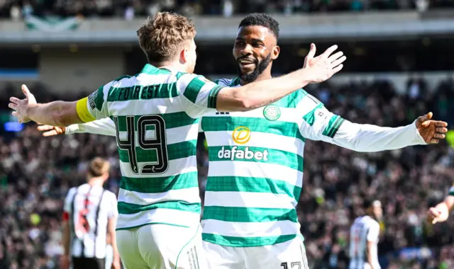 Celtic's Kelechi Iheanacho (R) celebrates scoring to make it 3-2 with James Forrest during a Scottish Gas Scottish Cup semi-final match between Celtic and St Mirren at Barclays Hampden, on April 19, 2026, in Glasgow,