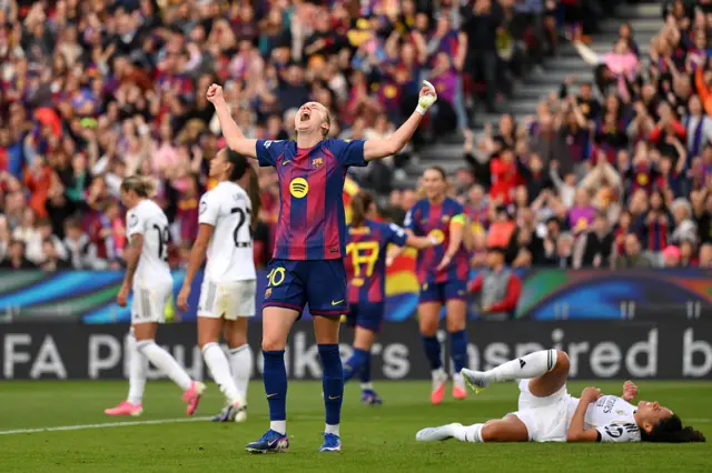 Hansen shouts into the sky as she celebrates her goal