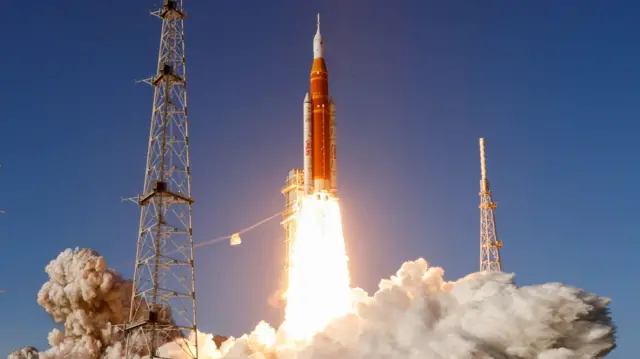 The Space Launch System (SLS) rocket with the Orion crew capsule, lifts off from the Kennedy Space Center in Cape Canaveral