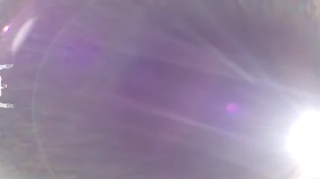 A pretty blurry photo showing a very bright light on the right, and a small section of Orion on the left