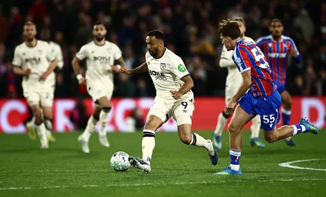 Crystal Palace's Justin Devenny vies with West Ham United's Callum Wilson