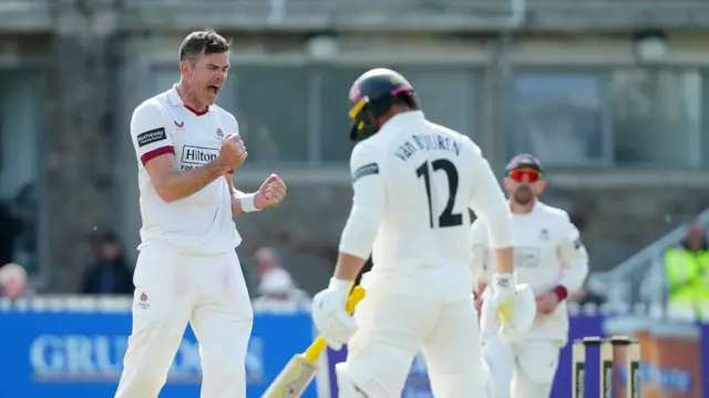 James Anderson celebrating taking the wicket of Graeme van Buuren for Lancashire.