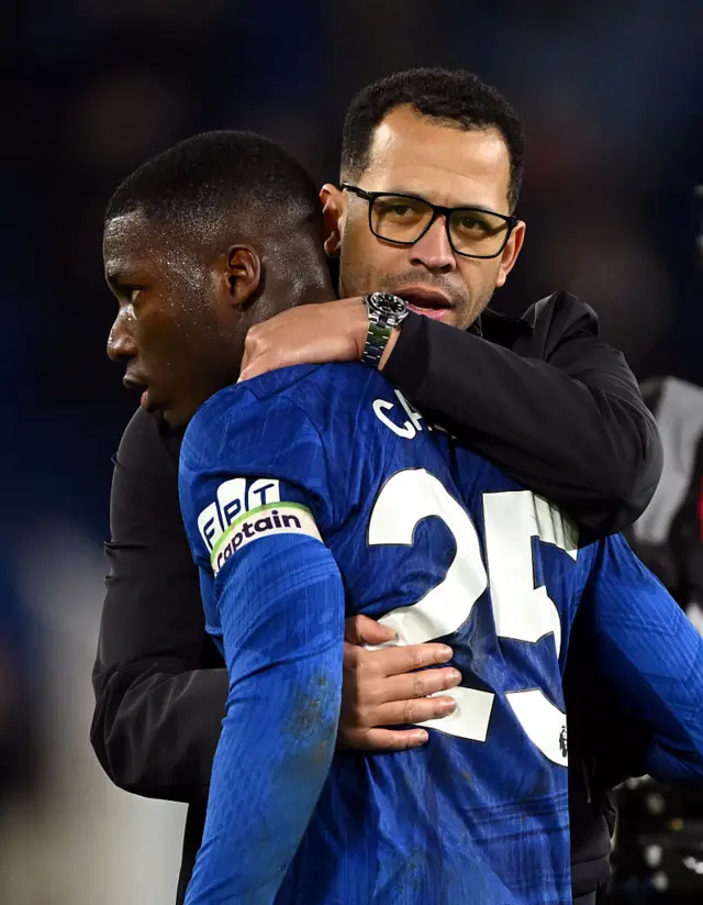 Liam Rosenior hugs Moises Caicedo