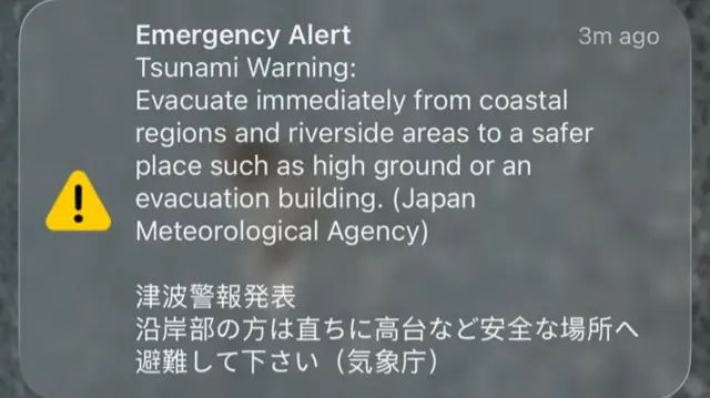 A screenshot of a phone screen which shows the earthquake warning alerts coming in on a phone
