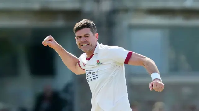Sir James Anderson celebrating taking a wicket for Lancashire by punching the air.