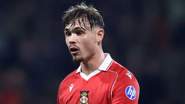 Callum Doyle in action for Wrexham
