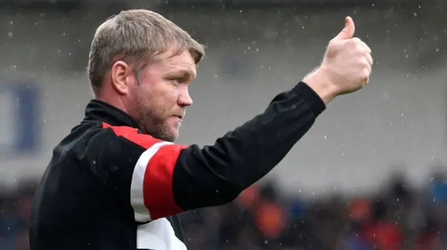 Doncaster boss Grant McCann gives a thumbs-up sign to his players