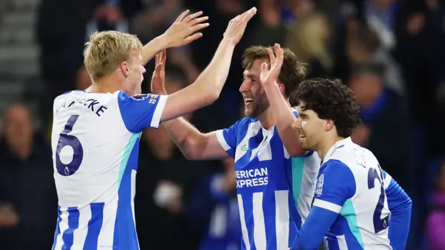 Jack Hinshelwood celebrates with his teammates