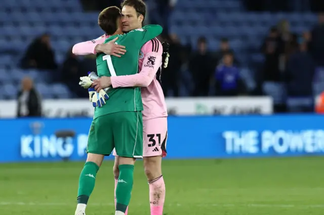 Asmir Begovic and Ivor Pandur hug at full time