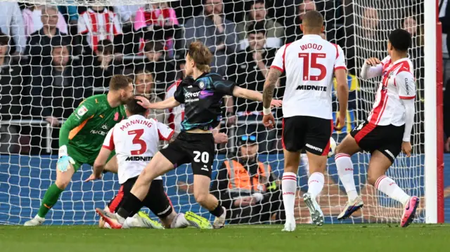 The ball strikes Ryan Manning and beats Southampton goalkeeper Daniel Peretz