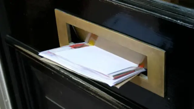 Envelopes coming through the letter box