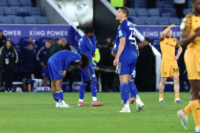 Leicester players look dejected at full time