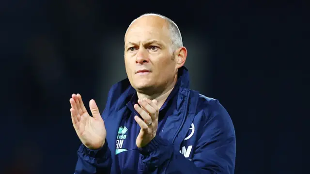 Millwall boss Alex Neil applauding his side's fans after a game.