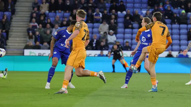 Liam Millar finishes past Leicester goalkeeper Asmir Begovic