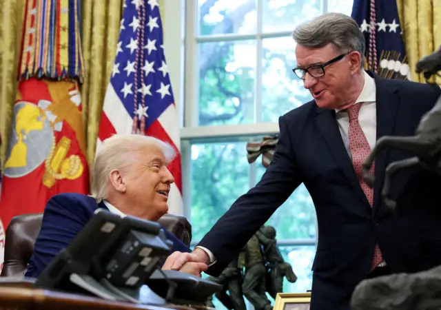 resident Donald Trump shakes hands with Britain's ambassador to the United States, Peter Mandelson in May 2025